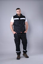 Crne radne pantalone, zimska jakna i prsluk Sayo